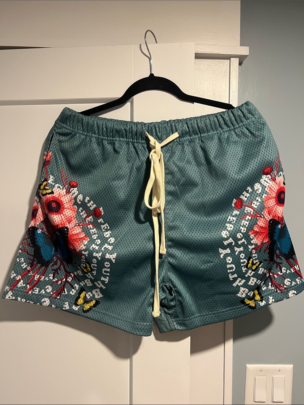 Teal Athletic Mesh Shorts with Floral Print and Drawstring